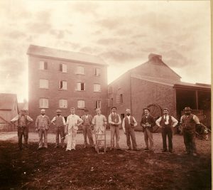 a group of workers at Roller Mills_ c. 1900, image courtesy of Tiverton Museum of Mid Devon Life